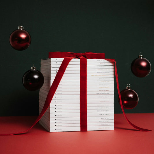 a book and a red ribbon